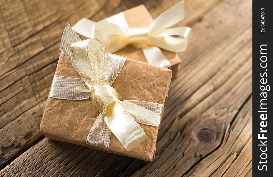Gift boxes on old wooden background
