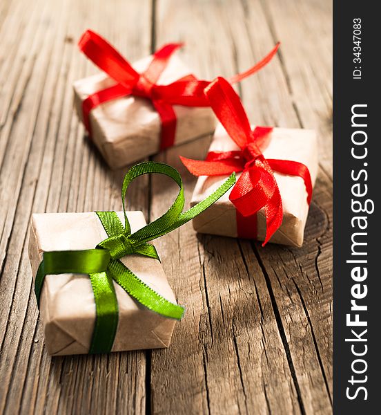 Gift boxes on old wooden background