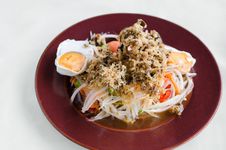 Papaya Salad With Crisp Fried Catfish And Salted Egg Royalty Free Stock Photography Papaya Salad With Crisp Fried Catfish And Salted Egg Royalty Free Stock Photography