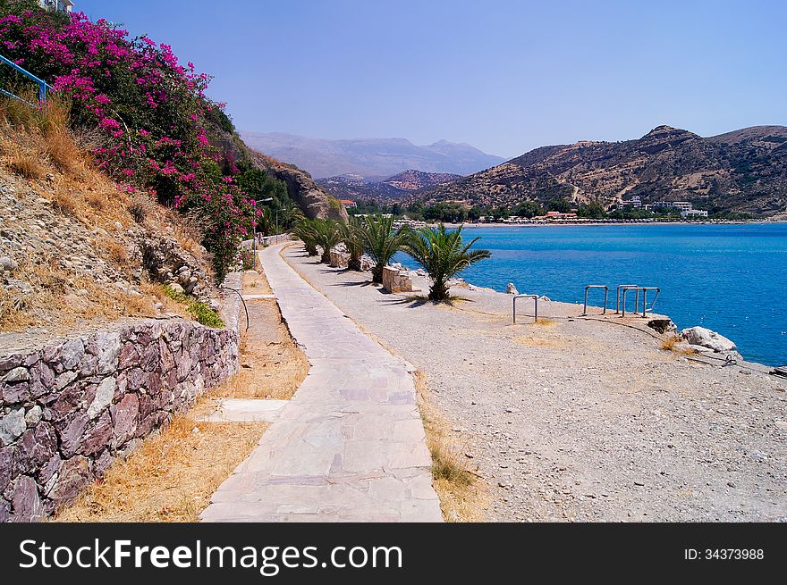 Footpath along the sea to the beach, the village of Agia Galini. Footpath along the sea to the beach, the village of Agia Galini