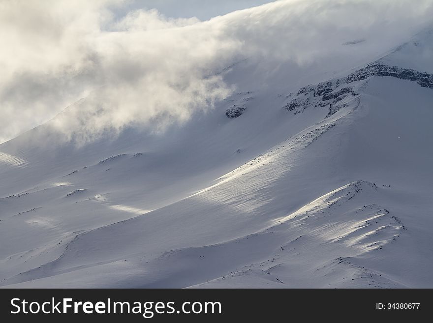 Snow and clouds in the mountains. Snow and clouds in the mountains