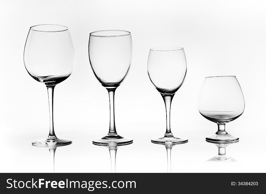 Group of glass cups over a white background. Group of glass cups over a white background