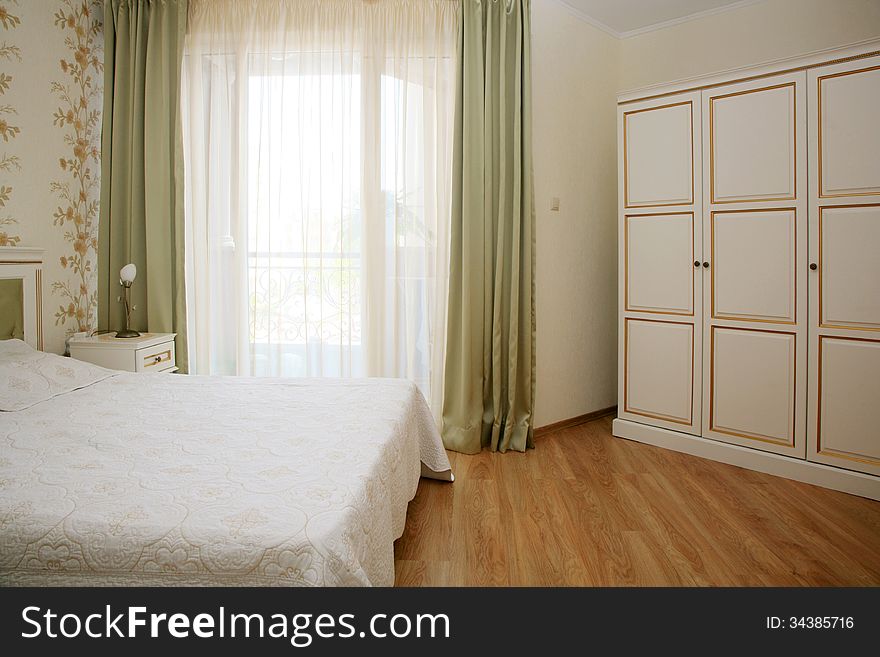 Antique style decorated bedroom interior