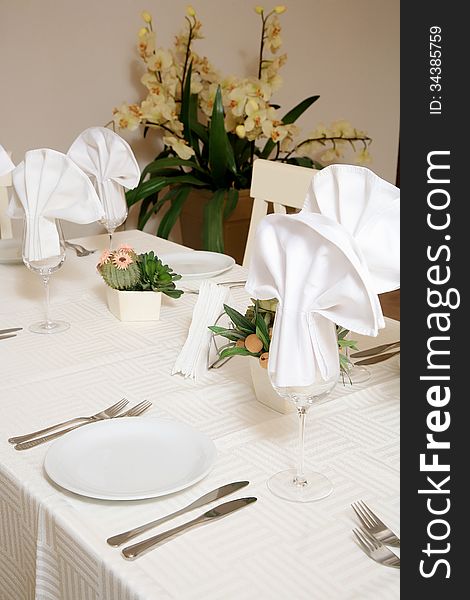 Restaurant table elegantly set for dining