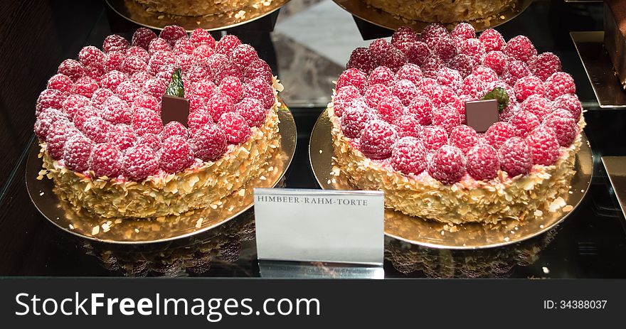 Rasberry Cake taken in a window of a shop in Zurich. Rasberry Cake taken in a window of a shop in Zurich