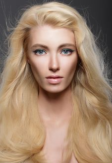Pure Beauty. Portrait Of Young Blonde With Healthy Flowing Hair Stock Images Pure Beauty. Portrait Of Young Blonde With Healthy Flowing Hair Stock Images