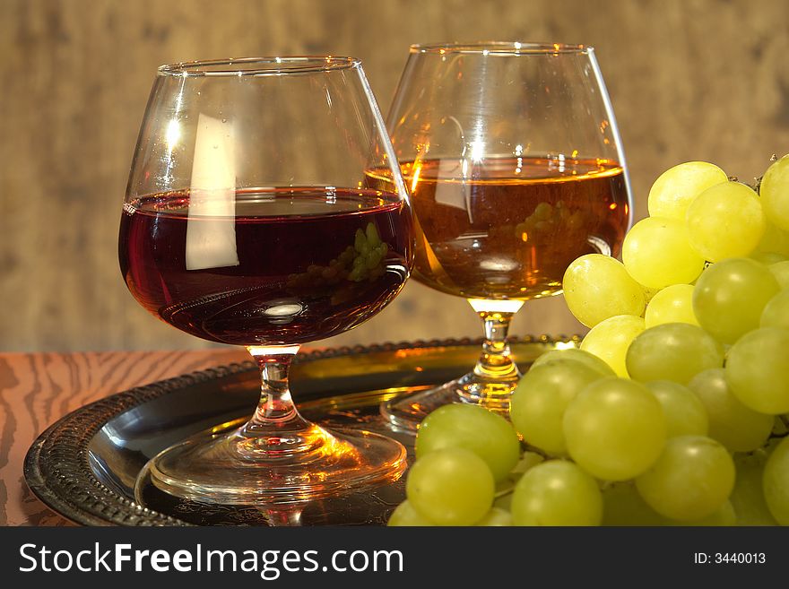 Grape juice on a brown background. Grape juice on a brown background