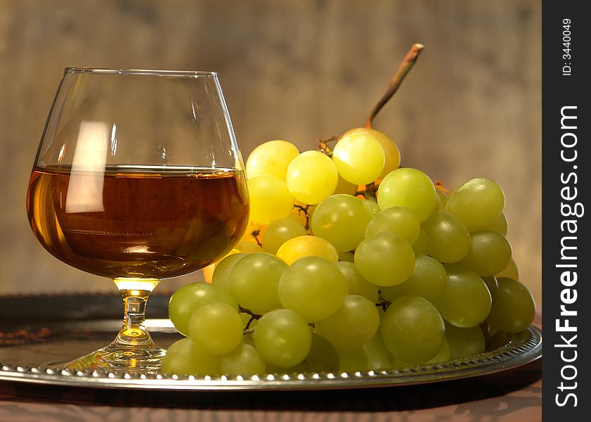 Grape juice on a brown background