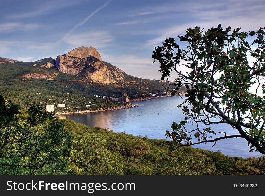 Black sea Crimea Laspi sunset sky sea clouds mountans tree gulf bay. Black sea Crimea Laspi sunset sky sea clouds mountans tree gulf bay