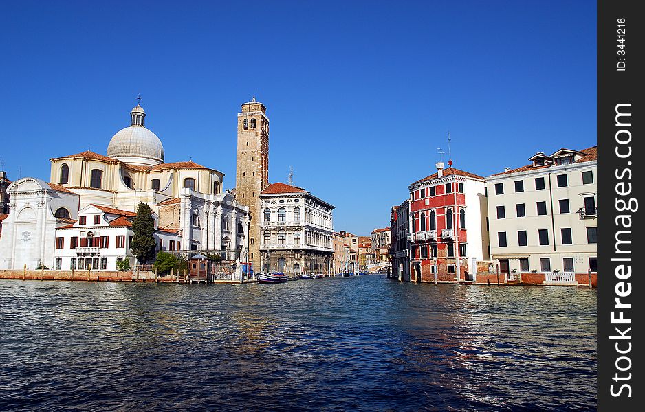 The mish mash of architecture in Venice with the dome of the Chiesa di san Lucia church towering high. The mish mash of architecture in Venice with the dome of the Chiesa di san Lucia church towering high.