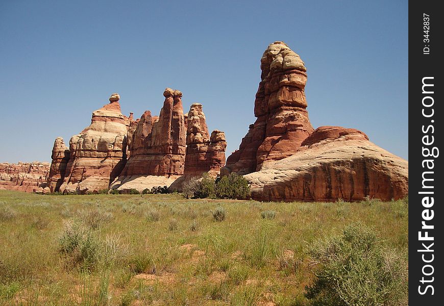 These unusually shaped rocks are located in Chesler Park in Canyonlands NP. These unusually shaped rocks are located in Chesler Park in Canyonlands NP