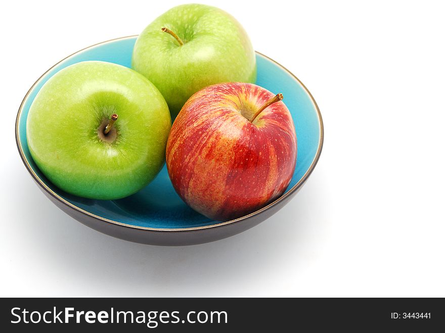 Blue bowl with apples