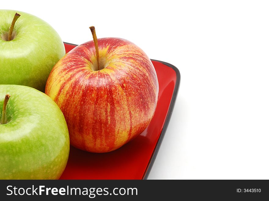 Three Apples On Red Plate