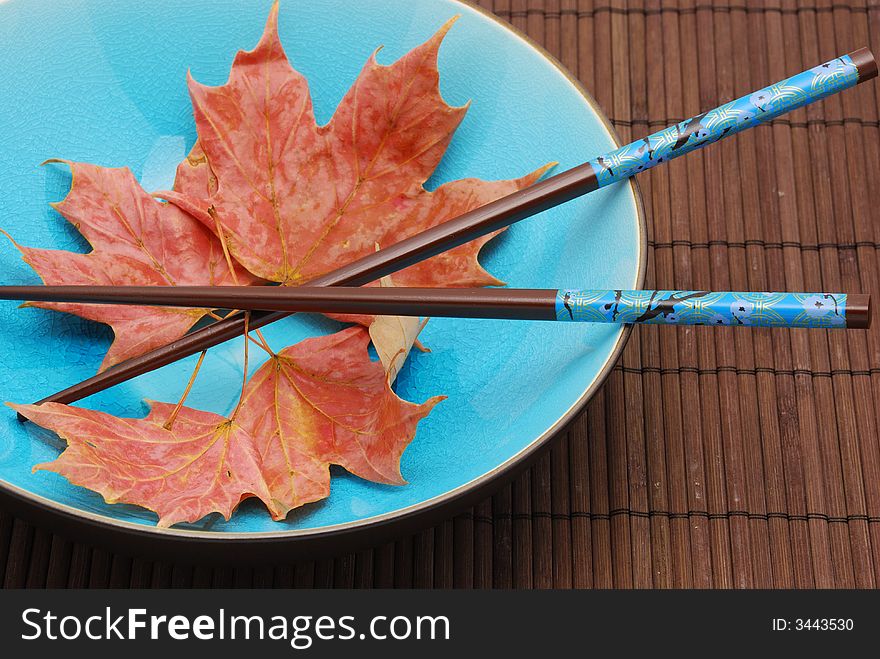 Blue bowl with chopsticks