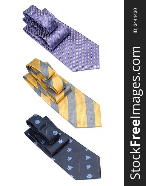 A display of three ties isolated on white.