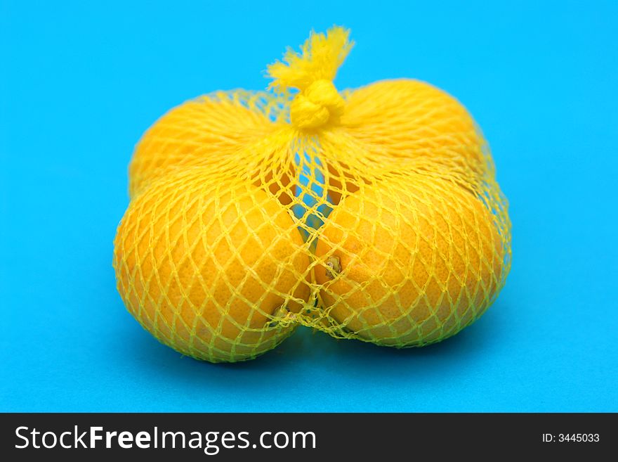 Lemons on the blue background