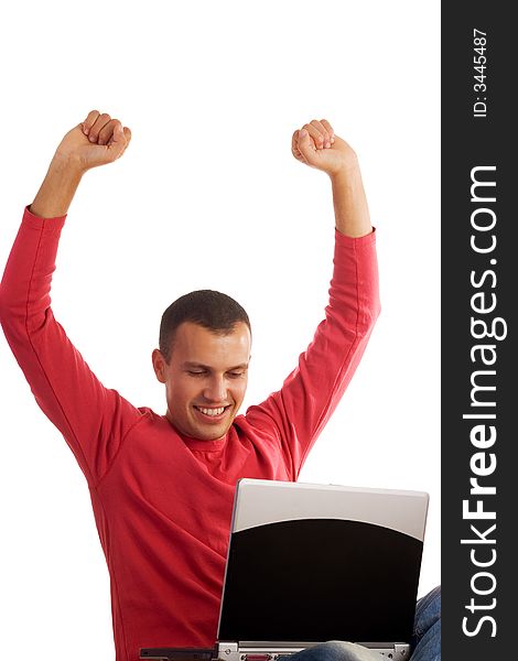 Young happy man working on laptop isolated on white background. Young happy man working on laptop isolated on white background