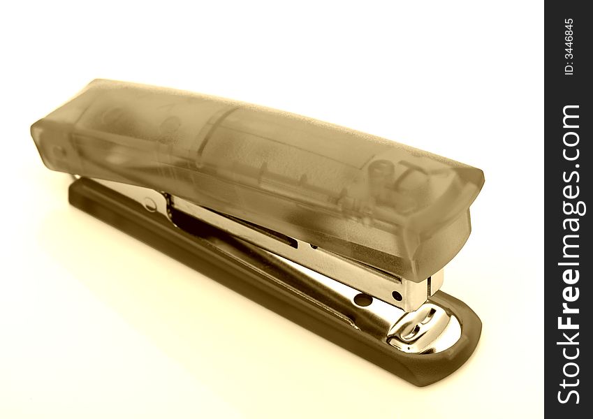 Photo of a stapler over a white background