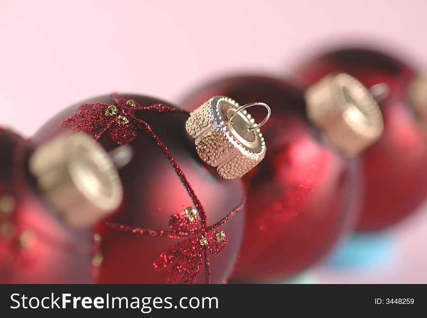 Christmas decoration balls on pink background