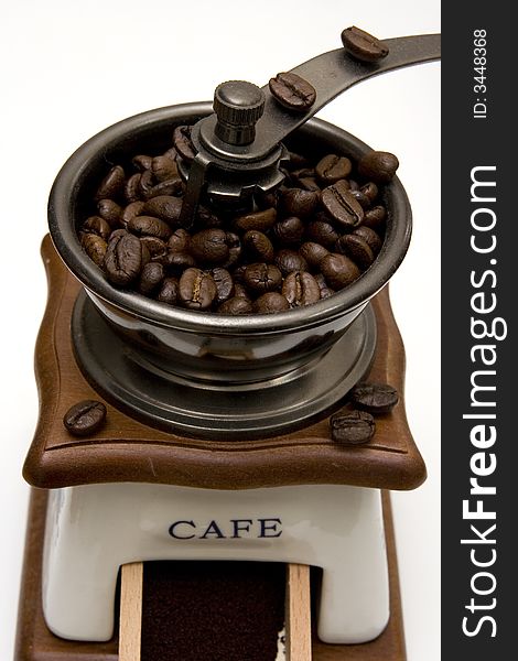 Coffee grinder full of beans