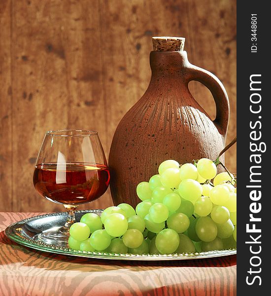 Glass of juice with grapes,