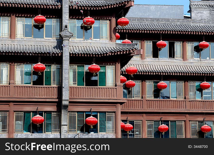 Many red chinese lanterns on the traditional building.Xian,China.