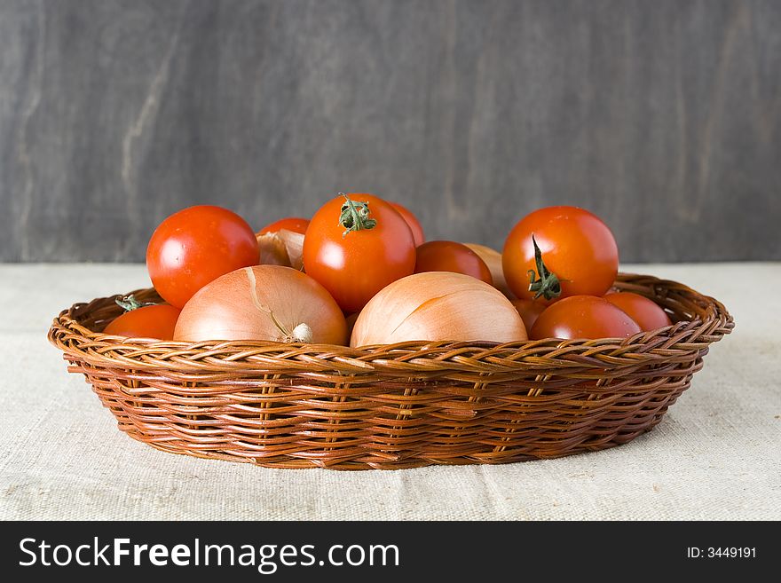 Red yellow apples in wicker tray