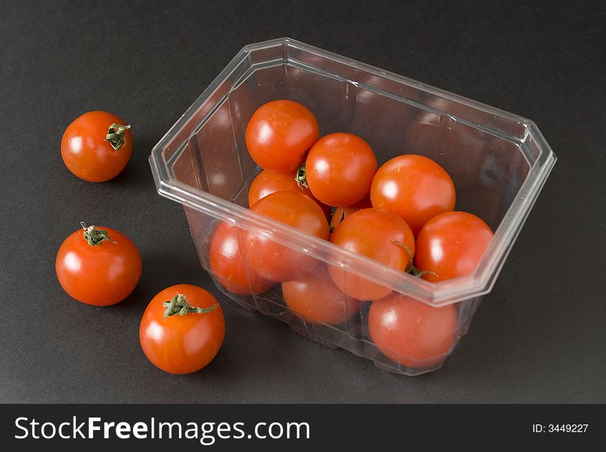 Cherry tomatoes in container