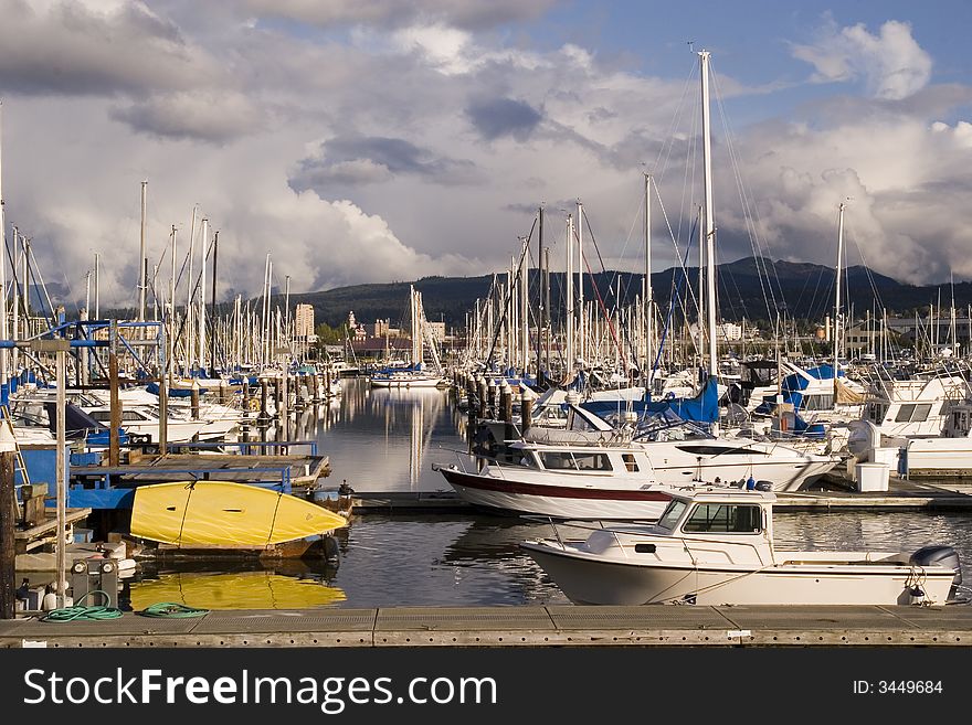 A large marina under a cloudy sky. A large marina under a cloudy sky