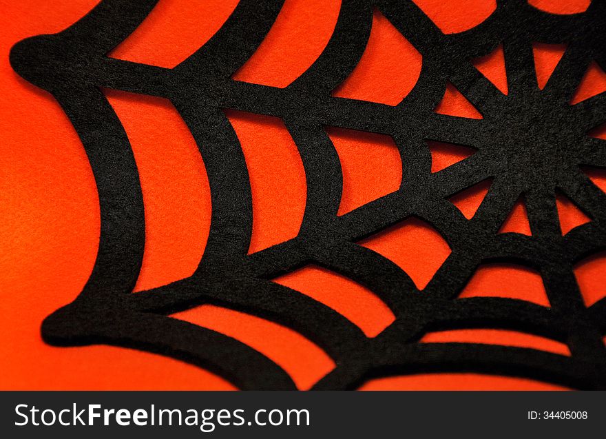Black Spider Web On An Orange Background