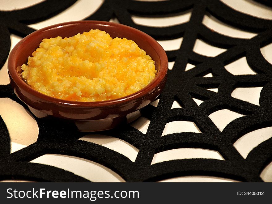 Pumpkin porridge and cereals on the black web