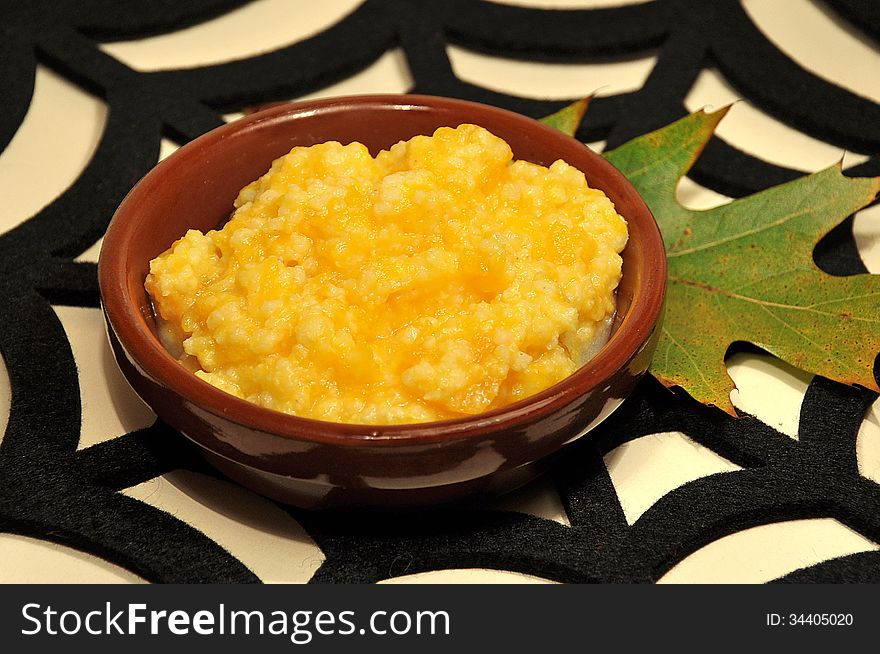 Pumpkin porridge and cereals on the black web