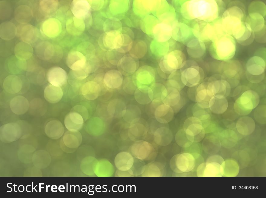 Abstract circular green bokeh background.