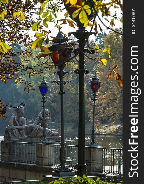 Stylish lanterns and sculptures in Lazienki Krolewskie park, Warsaw Poland
