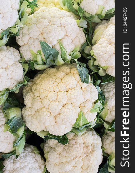 A number of cauliflowers in a market