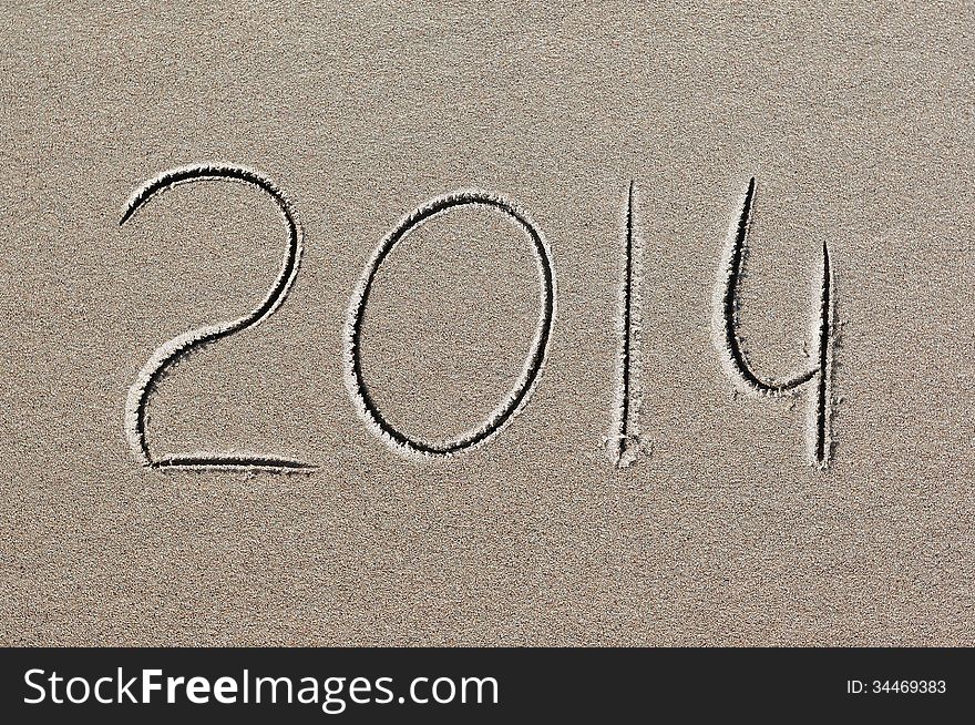 New Year 2014 Written In Sand