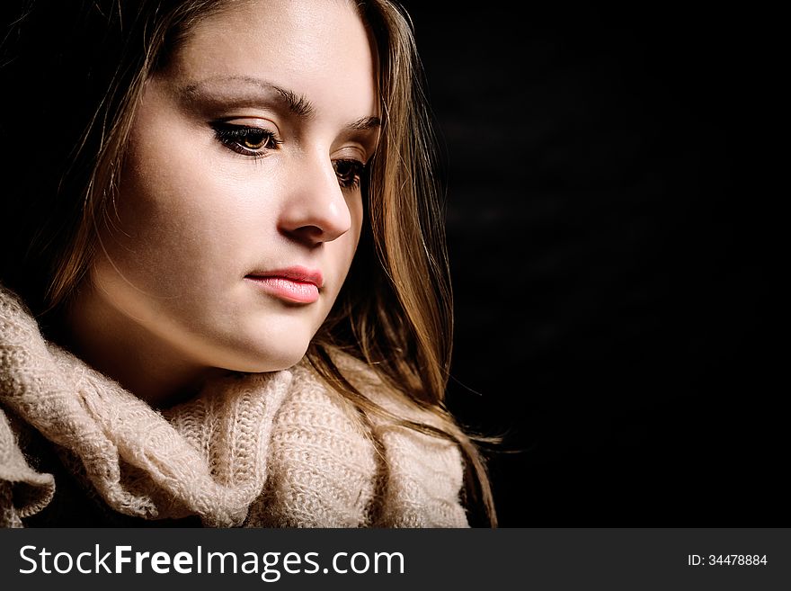 Portrait of young nice sensual girl in studio on black background. Portrait of young nice sensual girl in studio on black background