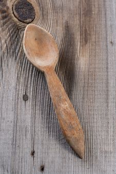 Wooden Spoon On A Wooden Background Royalty Free Stock Photography
