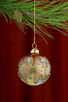 Gold Christmas Ornaments On Burgundy Background Royalty Free Stock Photo