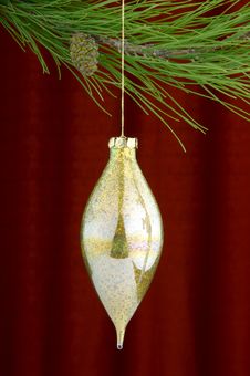 Gold Christmas Ornaments On Burgundy Background Royalty Free Stock Image