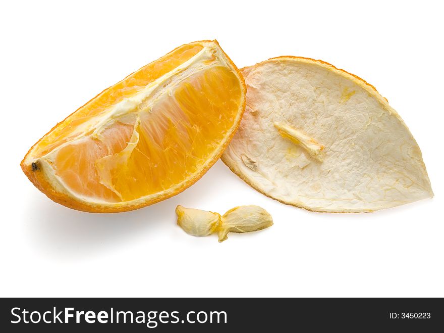 Dried orange segment with peel, isolated white