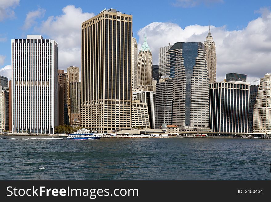 The Downtown area of Manhattan from the East River. The Downtown area of Manhattan from the East River