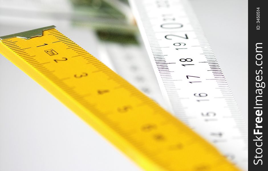 Folding meter on white background.