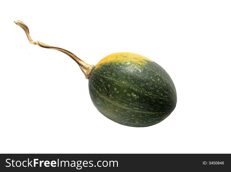Yellow and green gourd with stem, isolated on white background