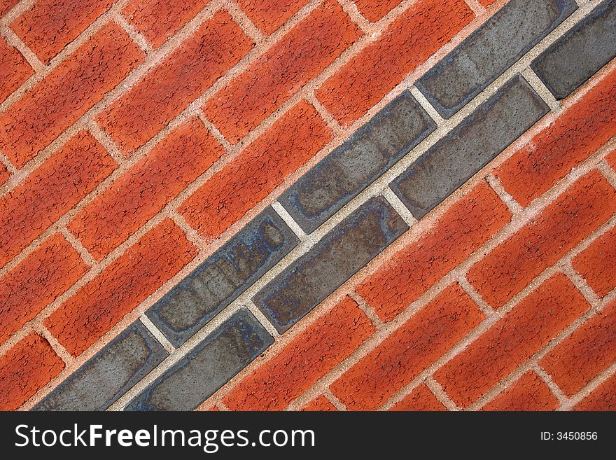 Red and dark grey bricks on a diagonal axis. Red and dark grey bricks on a diagonal axis.