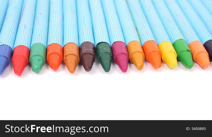 New color crayons on the white background