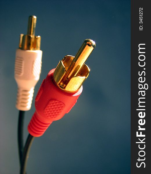 Red white plug with golden ends to loudspeakers. Red white plug with golden ends to loudspeakers.