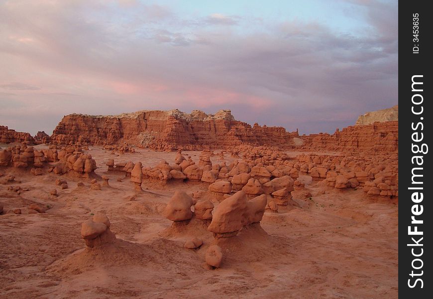 The picture of the sunset in Goblin Valley State Park in Utah. The picture of the sunset in Goblin Valley State Park in Utah.