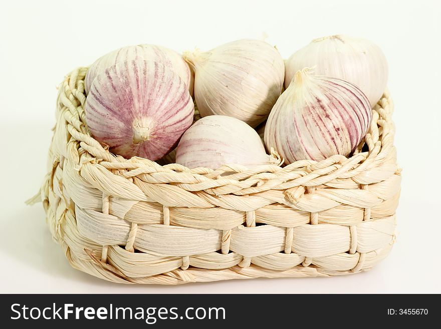 Garlic bulbs in a little basket