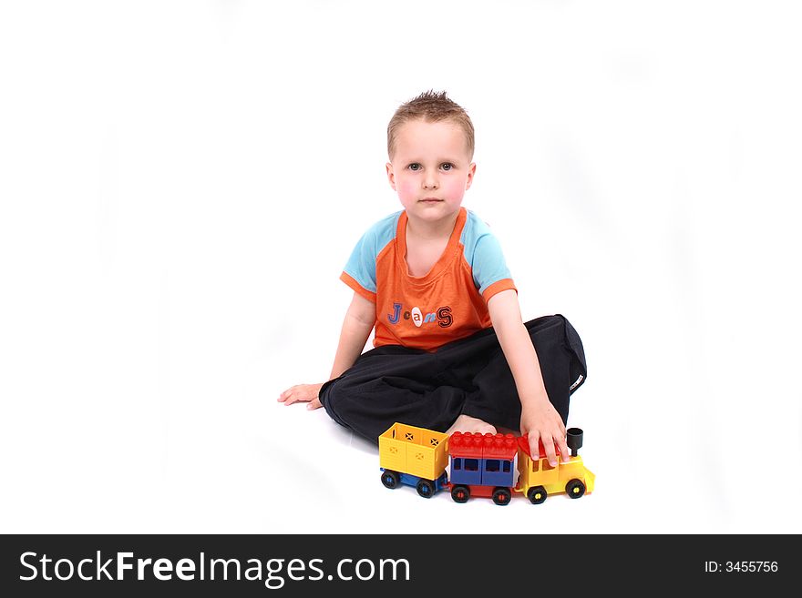 Nice young boy on the white background